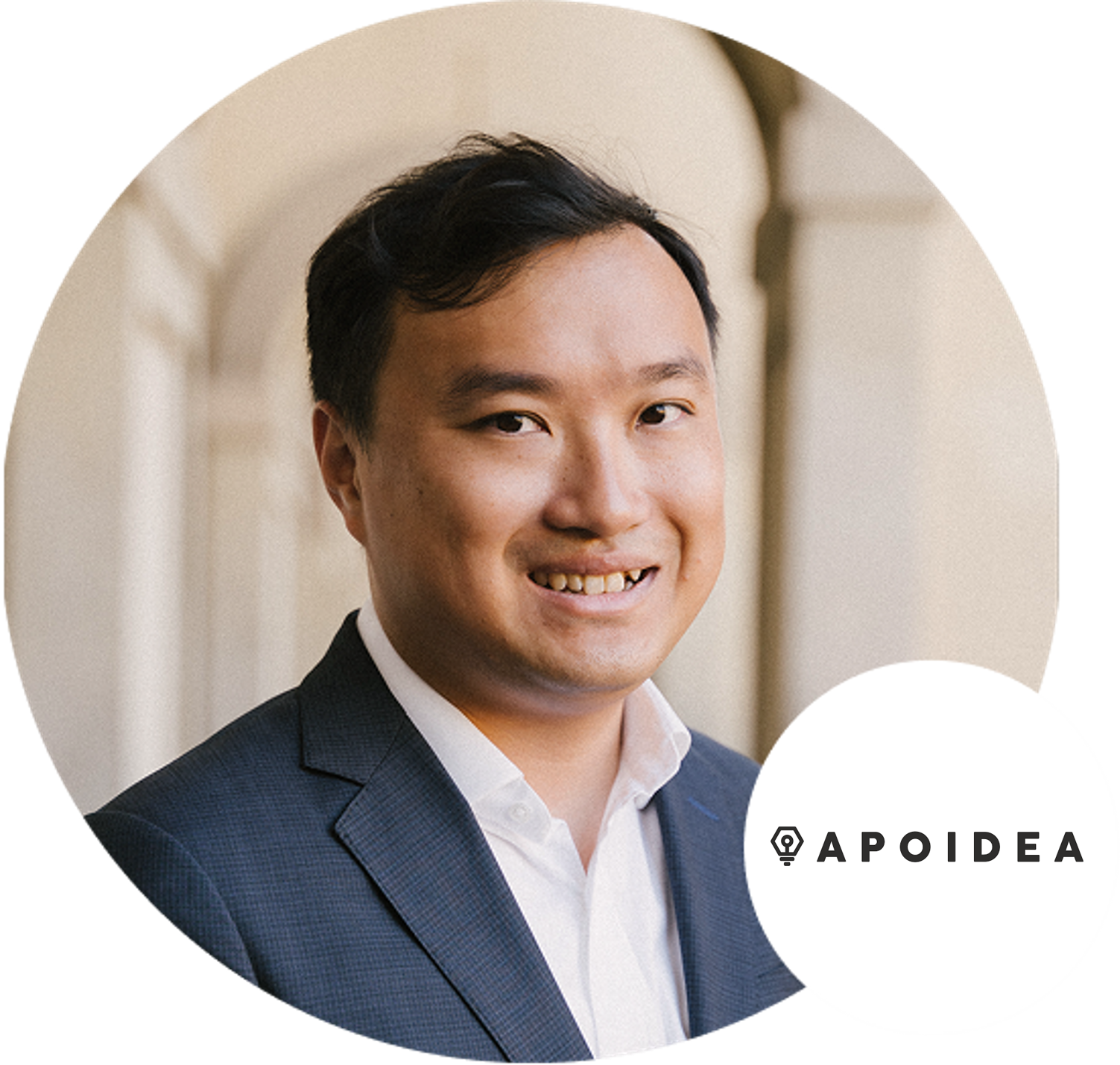 Profile photo of a man in a suit, with the Apoidea logo in the corner.