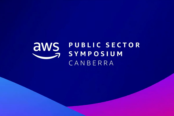 AWS Public Sector Symposium Canberra 2023 keynote graphic with AWS logo and abstract blue and purple background.