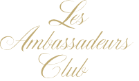 Logo image for Les Ambassadeurs Club in elegant gold script on a white background.