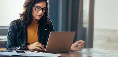 Asian woman working laptop. Business woman busy working on laptop computer at office.